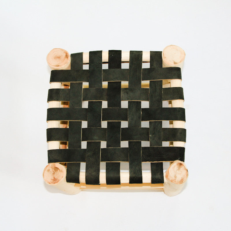 Tabouret tressé en cuir