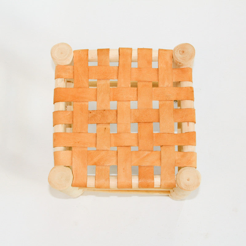 Tabouret tressé en cuir
