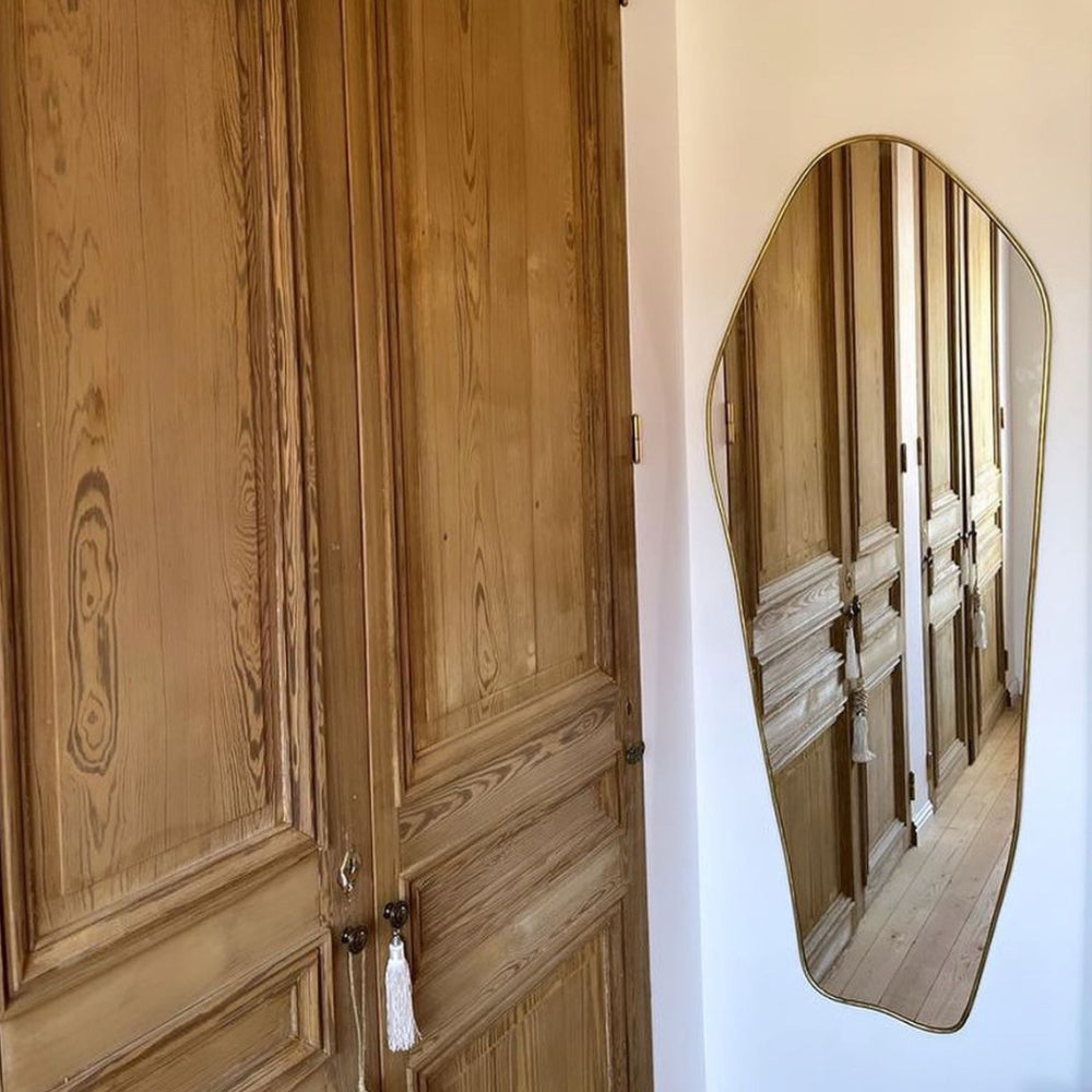Miroir mural en laiton asymétrique