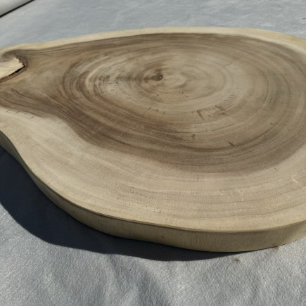 Table basse cookie en bois de suar massif 89x67x6 cm