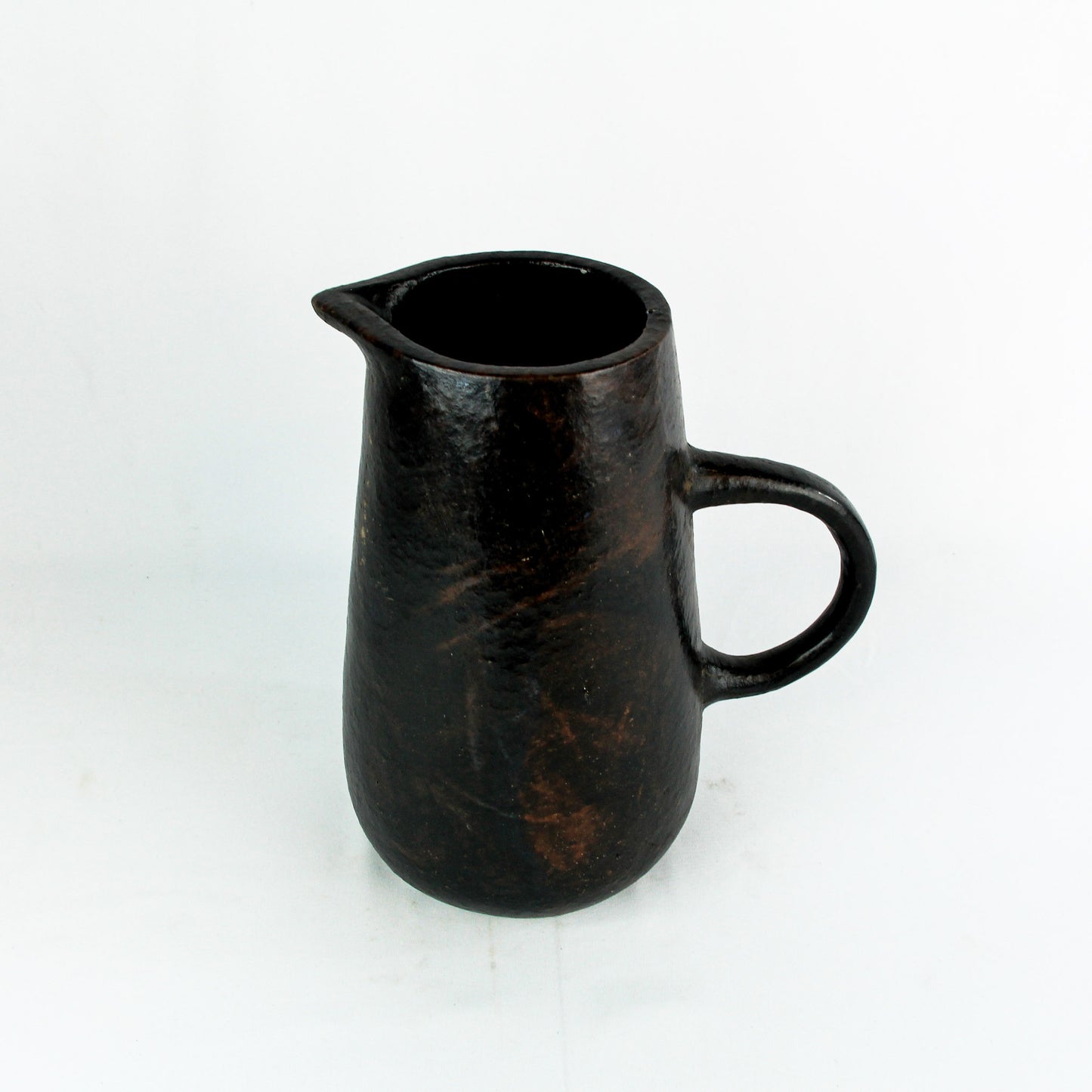 Carafe Bali déco: L'essence de Bali dans une pièce maîtresse en Argile